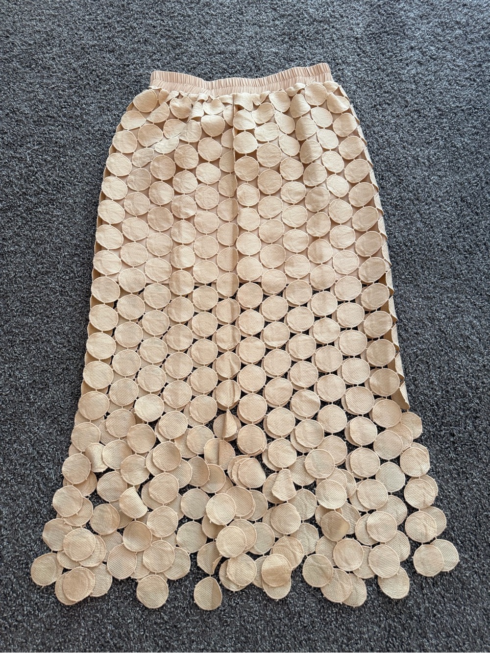Nude circle cutout midi skirt